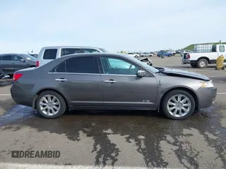 2011 Lincoln MKZ Hybrid with VIN 3LNDL2L39BR775289, listed as a IAAI auction lot 41834998 with 131,985 mi miles. Bid and sale history available at carsss.com. Image 13.