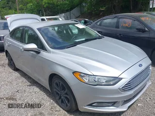 2018 Ford Fusion SE z VIN 3FA6P0HD7JR130779, wystawiony jako IAAI lot #42295049 z przebiegiem 37 635 mil mil oraz . Historia ofert i sprzedaży dostępna na DreamBid. Obrazek 1.
