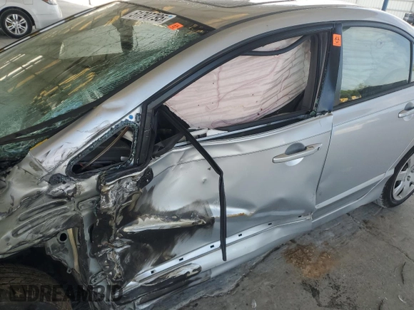 2006 Honda Civic LX with VIN 1HGFA16506L065908, listed as a Copart auction lot 51797795 with 87,456 mi miles and Salvage Title. Bid and sale history available at DreamBid. Image 7.