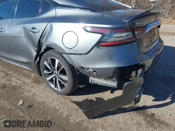 2019 Nissan Maxima SV with VIN 1N4AA6AV4KC373290, listed as a IAAI auction lot 41319597 with 51,698 mi miles and . Bid and sale history available at DreamBid. Image 6.