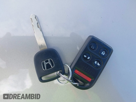 2006 Honda Odyssey EX-L z VIN 5FNRL38726B428227, wystawiony jako IAAI lot #42381464 z przebiegiem 156 623 mil mil oraz . Historia ofert i sprzedaży dostępna na DreamBid. Obrazek 11.
