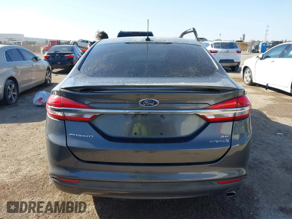 2018 Ford Fusion SE z VIN 3FA6P0LU8JR116073, wystawiony jako IAAI lot #41773037 z przebiegiem 100 864 mil mil oraz . Historia ofert i sprzedaży dostępna na DreamBid. Obrazek 16.