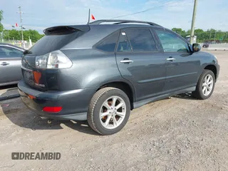 2008 Lexus RX with VIN 2T2HK31U28C063629, listed as a IAAI auction lot 42174790 with 204,595 mi miles. Bid and sale history available at carsss.com. Image 4.