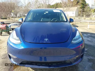 2023 Tesla Model Y Long Range with VIN 7SAYGDEE4PA042757, listed as a IAAI auction lot 41652541 with 48,569 mi miles. Bid and sale history available at carsss.com. Image 13.