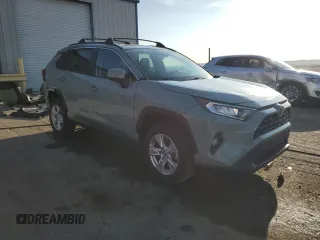 2019 Toyota RAV4 XLE with VIN 2T3P1RFV2KW020266, listed as a Copart auction lot 52183905 with 64,540 mi miles and Salvage title. Bid and sale history available at DreamBid. Image 4.