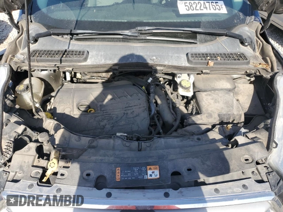 2017 Ford Escape SE z VIN 1FMCU0GD3HUF08778, wystawiony jako Copart lot #58224765 z przebiegiem 67 211 mil mil oraz Szkoda całkowita • Salvage title. Historia ofert i sprzedaży dostępna na DreamBid. Obrazek 11.