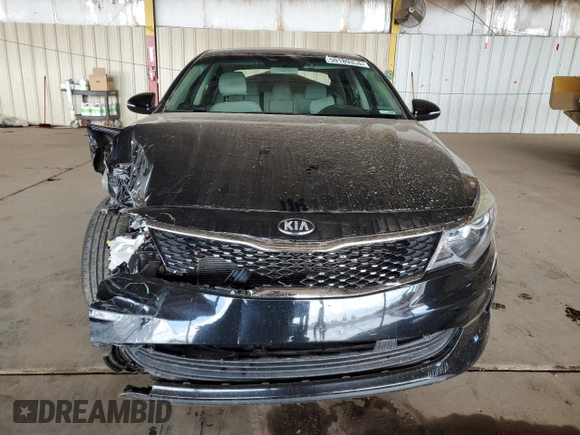 2017 Kia Optima LX z VIN 5XXGT4L31HG164323, wystawiony jako Copart lot #59189335 z przebiegiem 60 354 mil mil oraz Szkoda całkowita • Salvage title. Historia ofert i sprzedaży dostępna na DreamBid. Obrazek 5.