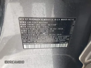 2018 Volkswagen Tiguan SEL z VIN 3VV3B7AXXJM205725, wystawiony jako IAAI lot #42285557 z przebiegiem 83 644 mil mil oraz . Historia ofert i sprzedaży dostępna na DreamBid. Obrazek 9.