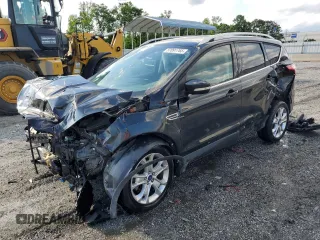 2015 Ford Escape Titanium with VIN 1FMCU0J96FUC59510, listed as a Copart auction lot 57091765 with 120,586 mi miles and Salvage title. Bid and sale history available at DreamBid. Image 1.
