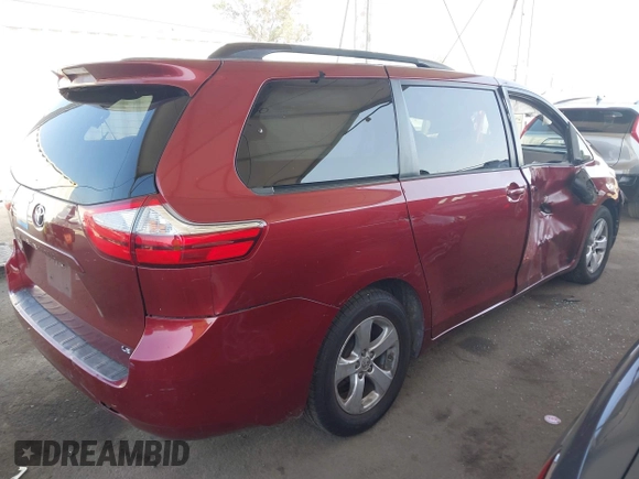 2015 Toyota Sienna LE AAS with VIN 5TDKK3DC7FS563562, listed as a IAAI auction lot 42374720 with 95,040 mi miles and . Bid and sale history available at DreamBid. Image 4.