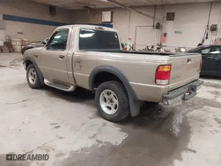 1999 Ford Ranger XLT with VIN 1FTYR11X0XTA72917, listed as a IAAI auction lot 41502156 with 106,585 mi miles. Bid and sale history available at carsss.com. Image 3.