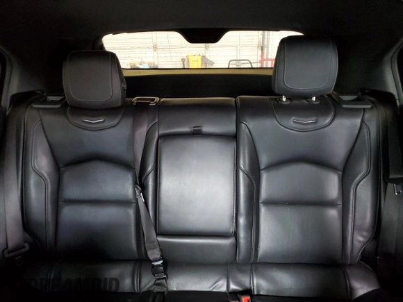 2019 Cadillac XT4 FWD Premium Luxury with VIN 1GYFZCR46KF198424, listed as a Copart auction lot 55465185 with 84,706 mi miles and Salvage title. Bid and sale history available at DreamBid. Image 10.