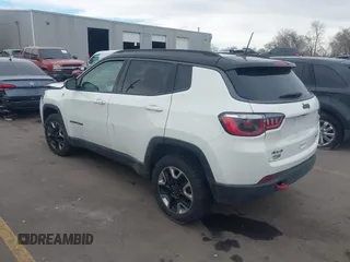 2018 Jeep Compass Trailhawk with VIN 3C4NJDDB9JT174899, listed as a IAAI auction lot 41635784 with 124,656 mi miles and . Bid and sale history available at DreamBid. Image 3.