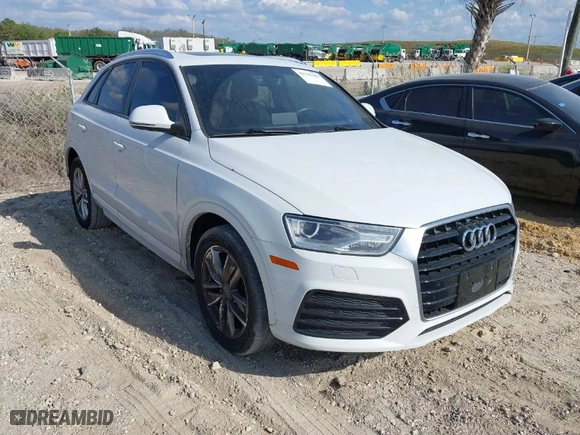 2018 Audi Q3 Premium with VIN WA1BCCFS6JR010047, listed as a IAAI auction lot 41795209 with 99,609 mi miles. Bid and sale history available at carsss.com. Image 1.