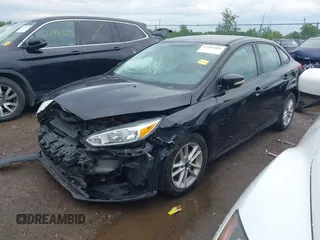 2017 Ford Focus SE z VIN 1FADP3F25HL253466, wystawiony jako IAAI lot #42303404 z przebiegiem 89 779 mil mil oraz . Historia ofert i sprzedaży dostępna na DreamBid. Obrazek 18.