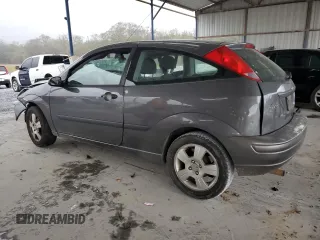 2003 Ford Focus ZX3 with VIN 3FAFP31Z73R178518, listed as a Copart auction lot 50200105 with 317,147 mi miles and Salvage title. Bid and sale history available at DreamBid. Image 2.