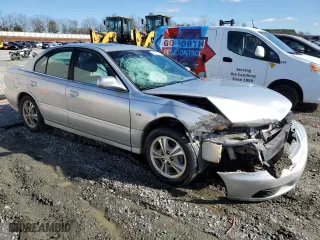 2002 Mitsubishi Galant ES with VIN 4A3AA46H42E060744, listed as a Copart auction lot 37732694 with 173,507 mi miles and Salvage Title. Bid and sale history available at carsss.com. Image 4.