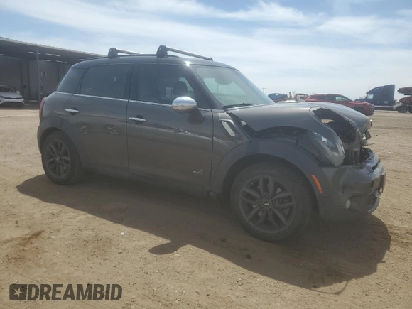 2013 MINI Countryman S ALL4 z VIN WMWZC5C56DWM16203, wystawiony jako Copart lot #54346425 z przebiegiem 148 065 mil mil oraz Szkoda całkowita • Salvage title. Historia ofert i sprzedaży dostępna na DreamBid. Obrazek 4.