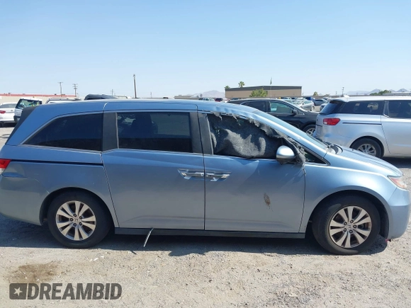 2014 Honda Odyssey EX-L with VIN 5FNRL5H65EB103900, listed as a IAAI auction lot 42592359 with 53,276 mi miles and . Bid and sale history available at DreamBid. Image 13.