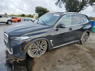 2024 BMW X5 xDrive40i with VIN 5UX23EU00R9U62752, listed as a Copart auction lot 85104184 with 23,547 mi miles and Salvage Title. Bid and sale history available at carsss.com. Image 1.