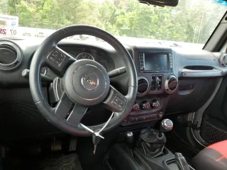 2016 Jeep Wrangler Unlimited Sport with VIN 1C4BJWDG8GL346676, listed as a Copart auction lot 57972665 with 57,515 mi miles and Salvage title. Bid and sale history available at DreamBid. Image 8.