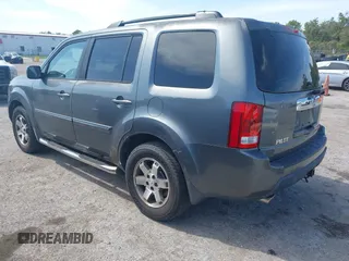 2011 Honda Pilot EX with VIN 5FNYF3H4XBB001140, listed as a IAAI auction lot 41940476 with 254,136 mi miles and . Bid and sale history available at carsss.com. Image 3.