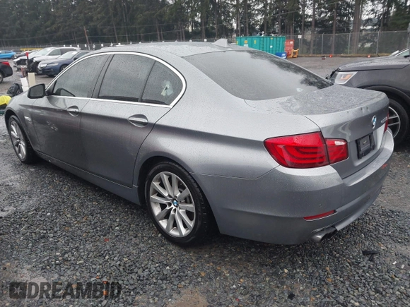 2012 BMW 5 Series 528i xDrive with VIN WBAXH5C52CDW05286, listed as a IAAI auction lot 41216636 with 99,543 mi miles and . Bid and sale history available at DreamBid. Image 3.