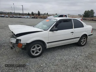1996 Toyota Tercel DX z VIN JT2AC52L5T0145290, wystawiony jako Copart lot #45027855 z przebiegiem 186 673 mil mil oraz Szkody całkowita. Historia ofert i sprzedaży dostępna na DreamBid. Obrazek 1.