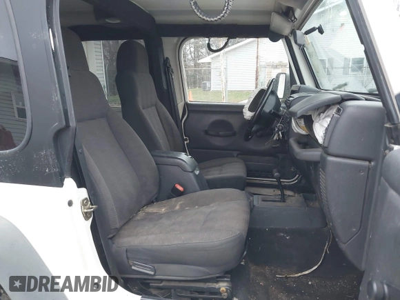 2005 Jeep Wrangler Sport with VIN 1J4FA49S25P352170, listed as a IAAI auction lot 41794958 with 154,304 mi miles. Bid and sale history available at carsss.com. Image 5.