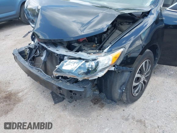 2014 Toyota Camry L with VIN 4T4BF1FKXER402857, listed as a IAAI auction lot 42144757 with 192,081 mi miles and . Bid and sale history available at DreamBid. Image 6.