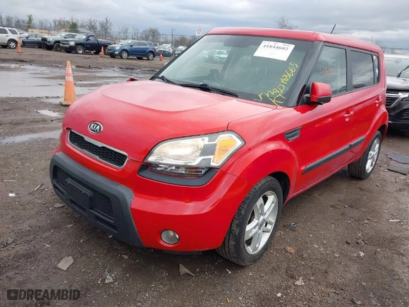 2011 Kia Soul + with VIN KNDJT2A28B7258221, listed as a IAAI auction lot 41844602 with 183,665 mi miles. Bid and sale history available at carsss.com. Image 2.