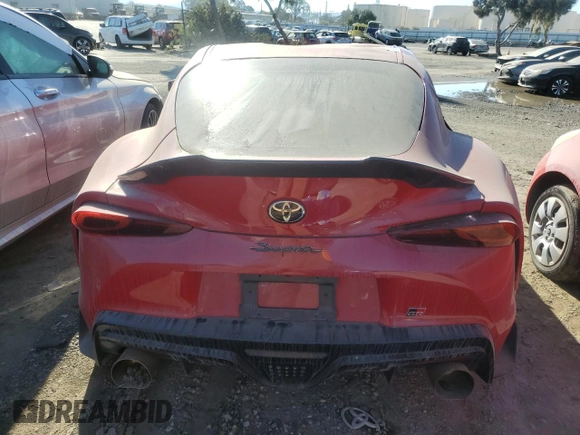 2022 Toyota Supra 3.0 z VIN WZ1DB0C04NW046282, wystawiony jako Copart lot #80995874 z przebiegiem 32 087 mil mil oraz Szkoda całkowita • Salvage title. Historia ofert i sprzedaży dostępna na DreamBid. Obrazek 6.