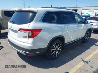2021 Honda Pilot Touring 8-Passenger z VIN 5FNYF6H94MB087593, wystawiony jako IAAI lot #42153310 z przebiegiem 30 400 mil mil oraz . Historia ofert i sprzedaży dostępna na DreamBid. Obrazek 4.