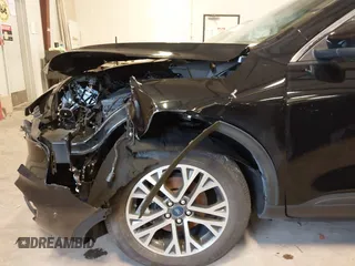 2021 Ford Escape SEL with VIN 1FMCU9H92MUA28112, listed as a IAAI auction lot 41510577 with 57,407 mi miles and . Bid and sale history available at DreamBid. Image 12.