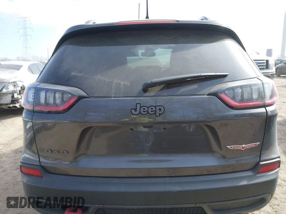 2022 Jeep Cherokee Trailhawk with VIN 1C4PJMBX4ND536592, listed as a IAAI auction lot 41792322 with 43,611 mi miles and . Bid and sale history available at DreamBid. Image 16.