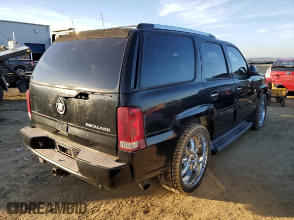 2003 Cadillac Escalade z VIN 1GYEC63TX3R135227, wystawiony jako Copart lot #88373245 z przebiegiem 258 595 mil mil oraz Czysty tytuł • Clean title. Historia ofert i sprzedaży dostępna na DreamBid. Obrazek 3.