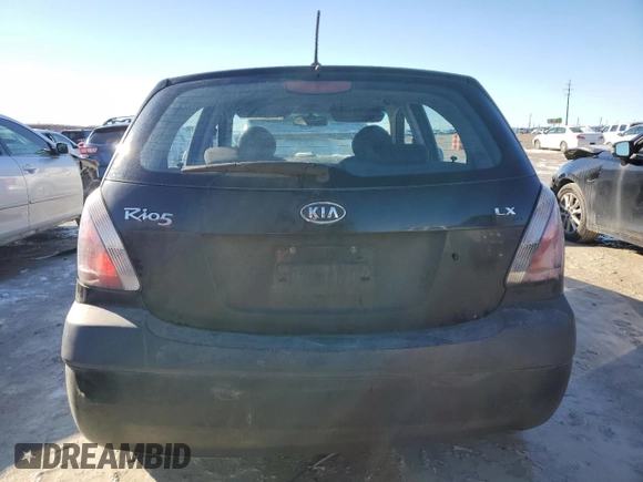 2009 Kia Rio LX with VIN KNADE243796516902, listed as a Copart auction lot 86567394 with 304,684 mi miles and Salvage Title. Bid and sale history available at carsss.com. Image 6.