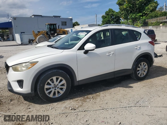 2014 Mazda CX-5 Sport with VIN JM3KE2BE9E0344990, listed as a Copart auction lot 59014145 with 126,905 mi miles and Salvage title. Bid and sale history available at DreamBid. Image 1.