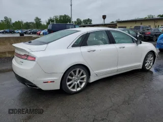 2015 Lincoln MKZ z VIN 3LN6L2J9XFR605027, wystawiony jako Copart lot #57724605 z przebiegiem 76 845 mil mil oraz Czysty tytuł • Clean title. Historia ofert i sprzedaży dostępna na DreamBid. Obrazek 3.