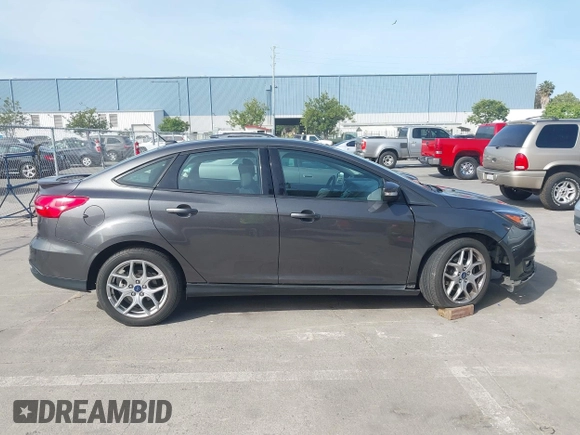 2015 Ford Focus SE with VIN 1FADP3F25FL348929, listed as a IAAI auction lot 42275725 with 99,668 mi miles and . Bid and sale history available at DreamBid. Image 14.