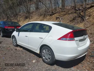 2011 Honda Insight with VIN JHMZE2H30BS012285, listed as a IAAI auction lot 42145139 with 161,672 mi miles and . Bid and sale history available at DreamBid. Image 3.