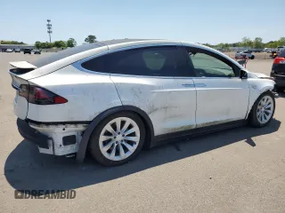 2016 Tesla Model X 70D z VIN 5YJXCAE26GF004233, wystawiony jako Copart lot #58378805 z przebiegiem 90 133 mil mil oraz Szkoda całkowita • Salvage title. Historia ofert i sprzedaży dostępna na DreamBid. Obrazek 3.