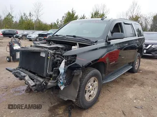 2020 Chevrolet Tahoe LS z VIN 1GNSCAKC1LR177807, wystawiony jako IAAI lot #41482578 z przebiegiem 75 010 mil mil oraz . Historia ofert i sprzedaży dostępna na DreamBid. Obrazek 18.