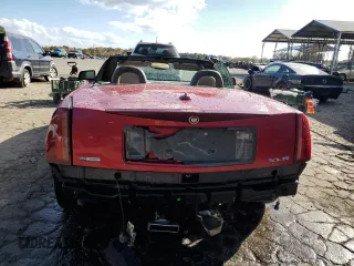 2005 Cadillac XLR z VIN 1G6YV34A555600826, wystawiony jako Copart lot #79404394 z przebiegiem 94 892 mil mil oraz Szkody całkowita. Historia ofert i sprzedaży dostępna na DreamBid. Obrazek 6.