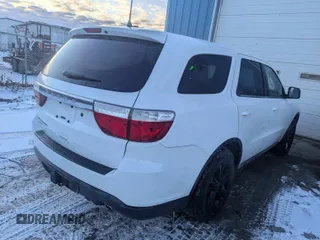 2013 Dodge Durango Special Service with VIN 1C4SDJFT9DC670963, listed as a IAAI auction lot 41538525 with 132,122 mi miles and . Bid and sale history available at carsss.com. Image 1.