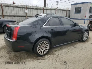 2010 Cadillac CTS z VIN 1G6DK5EG2A0128548, wystawiony jako Copart lot #55623815 z przebiegiem Nie podano mil oraz Szkoda całkowita • Salvage title. Historia ofert i sprzedaży dostępna na DreamBid. Obrazek 3.