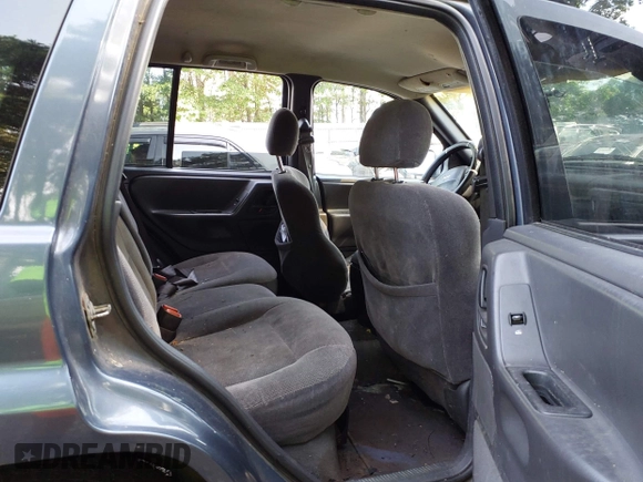 2001 Jeep Grand Cherokee Laredo with VIN 1J4GW48SX1C585867, listed as a IAAI auction lot 42793657 with 197,167 mi miles and . Bid and sale history available at DreamBid. Image 8.