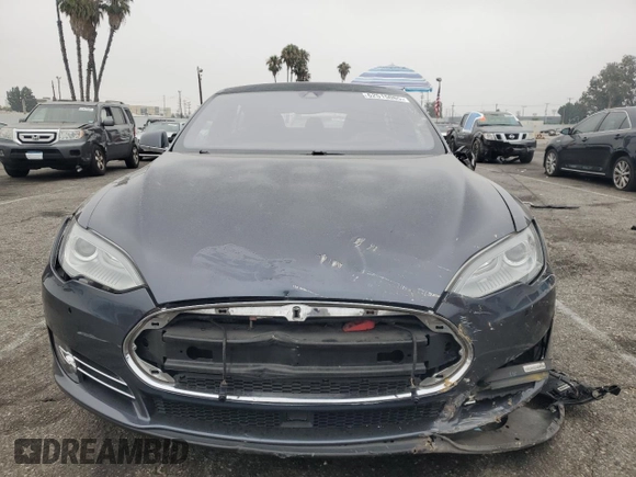 2014 Tesla Model S 60 with VIN 5YJSA1H10EFP60690, listed as a Copart auction lot 62515065 with 57,864 mi miles and Clean title. Bid and sale history available at DreamBid. Image 5.