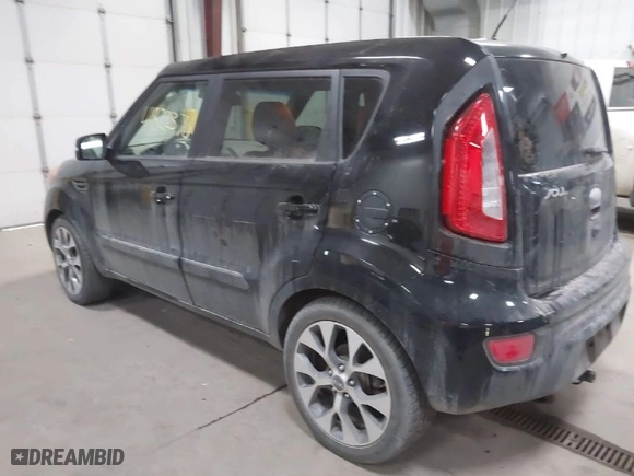 2013 Kia Soul + with VIN KNDJT2A62D7751897, listed as a IAAI auction lot 41822370 with 164,563 mi miles. Bid and sale history available at carsss.com. Image 3.