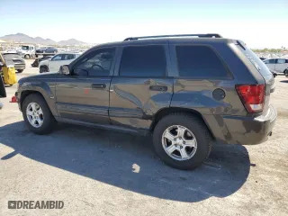 2005 Jeep Grand Cherokee Laredo with VIN 1J4HS48N55C732550, listed as a Copart auction lot 67326584 with 199,936 mi miles and Salvage Title. Bid and sale history available at carsss.com. Image 2.